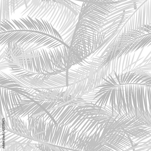 Light gray palm leaves silhouette on the white background. Vector seamless pattern with tropical plants. Vector pattern for print design, wallpaper, site backgrounds, postcard, textile, fabric.