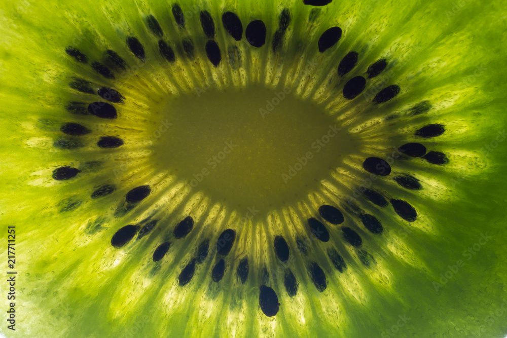 Kiwi fruit texture background with selective focus and crop fragment Kiwi fruit texture background with selective focus and crop fragment
