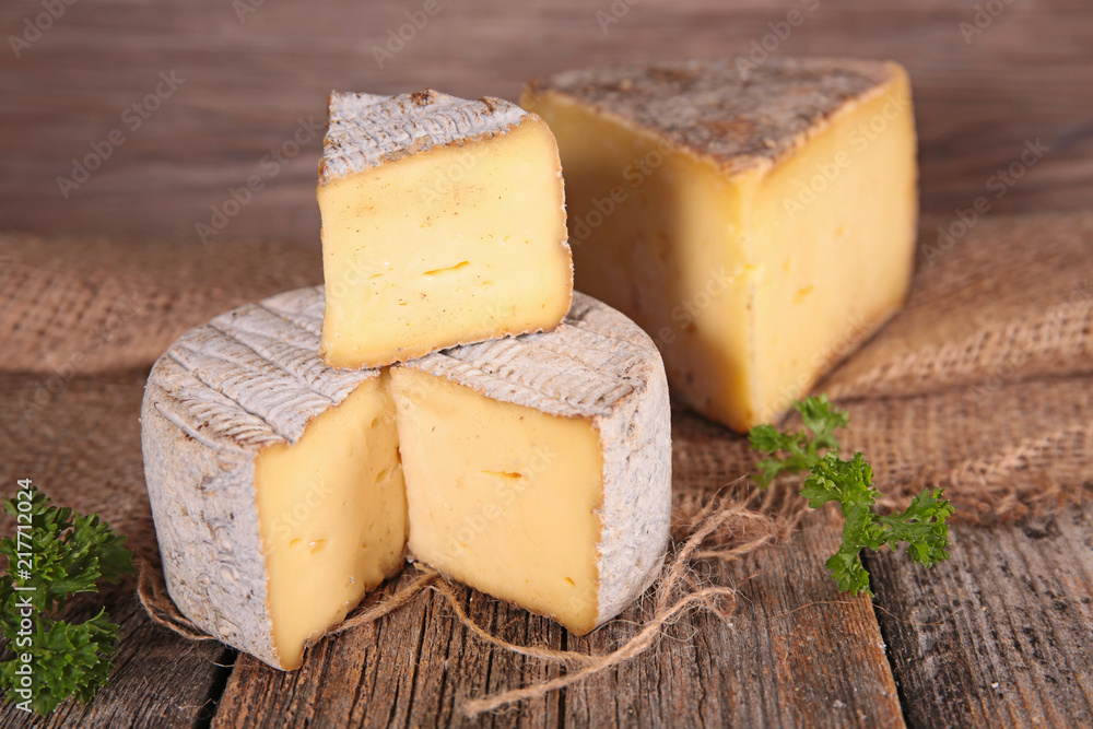 cheese on wood background cheese on wood background