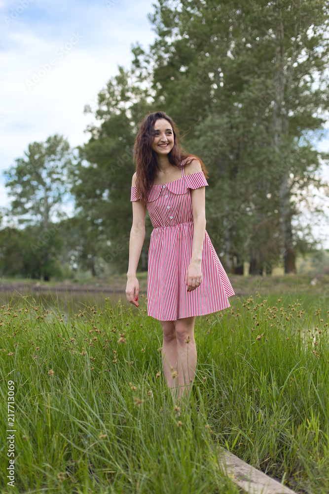 Portrait of a beautiful girl in the summer in the forest Portrait of a beautiful girl in the summer in the forest