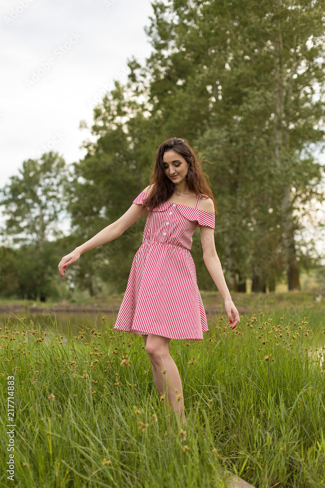Portrait of a beautiful girl in the summer in the forest Portrait of a beautiful girl in the summer in the forest