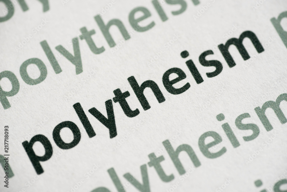 word polytheism printed on paper macro word polytheism printed on paper macro