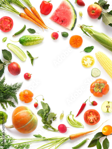 Frame of various vegetables and fruits isolated on white background, top view, creative flat layout.