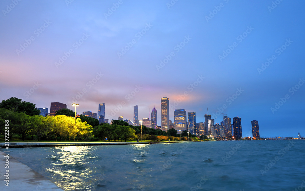 Chicago, Illinois, USA - June 22, 2018 - The Chicago skyline at night after a storm across Lake Michigan.