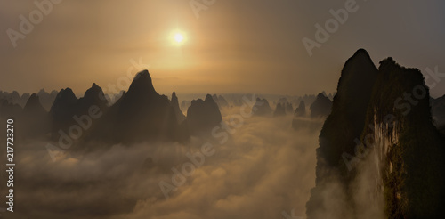 Chinese mountains in the mist sunrise
