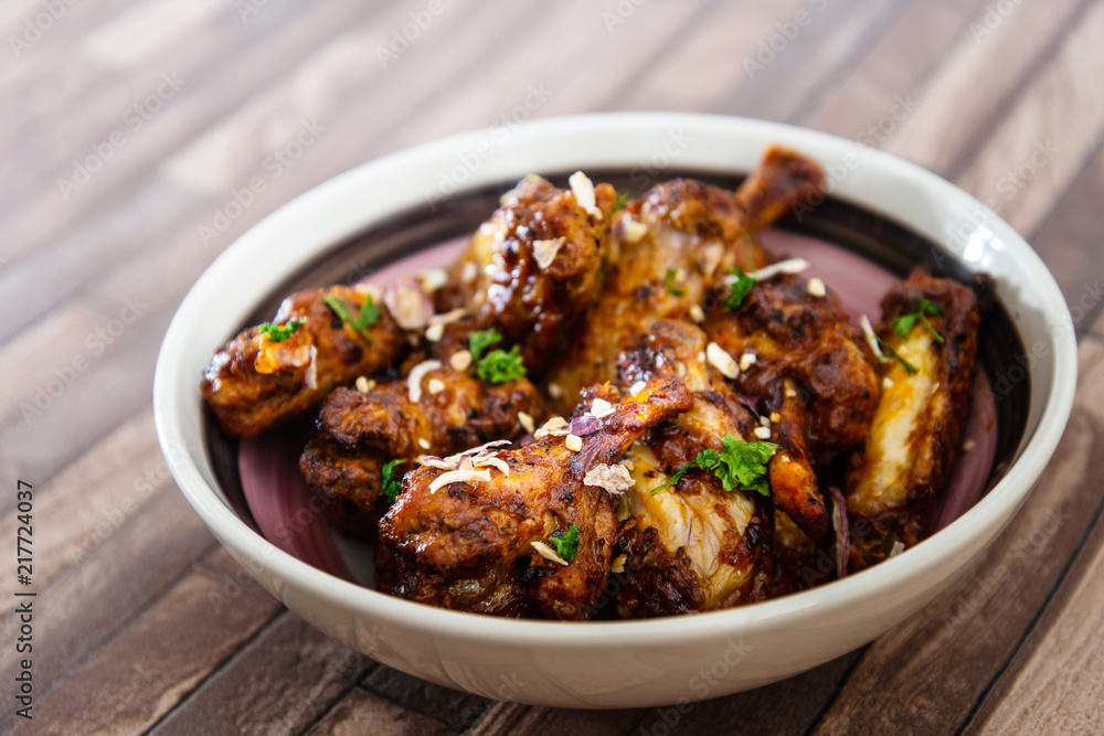 roasted sleeves chicken with potatoes and barbecue sauce roasted sleeves chicken with potatoes and barbecue sauce