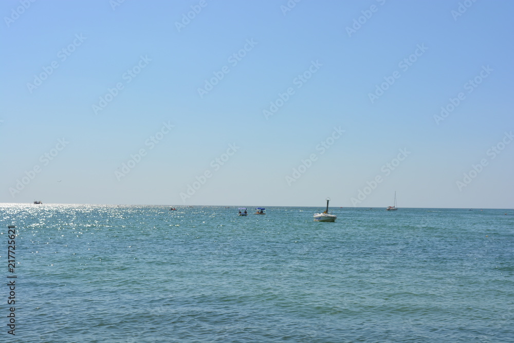 Blue sky with a blue smooth sea of the black sea