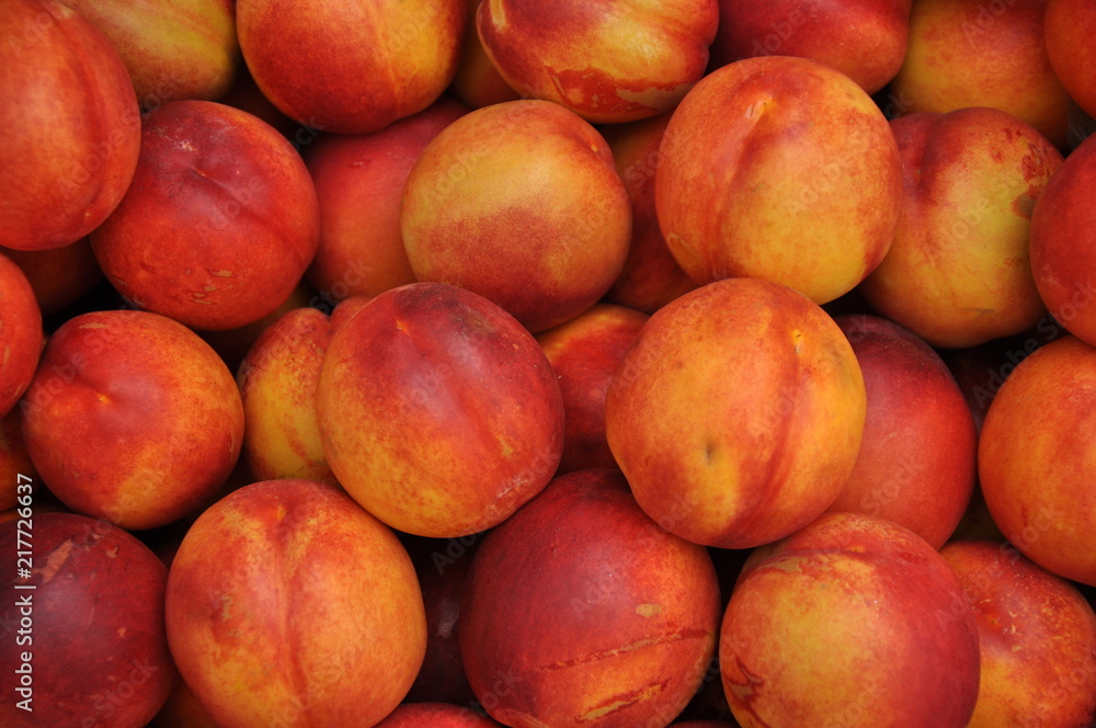 juicy ripe peaches. background juicy ripe peaches. background