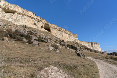 View from the top of the White Cliff in Crimea against the blue sky, to the village -3
