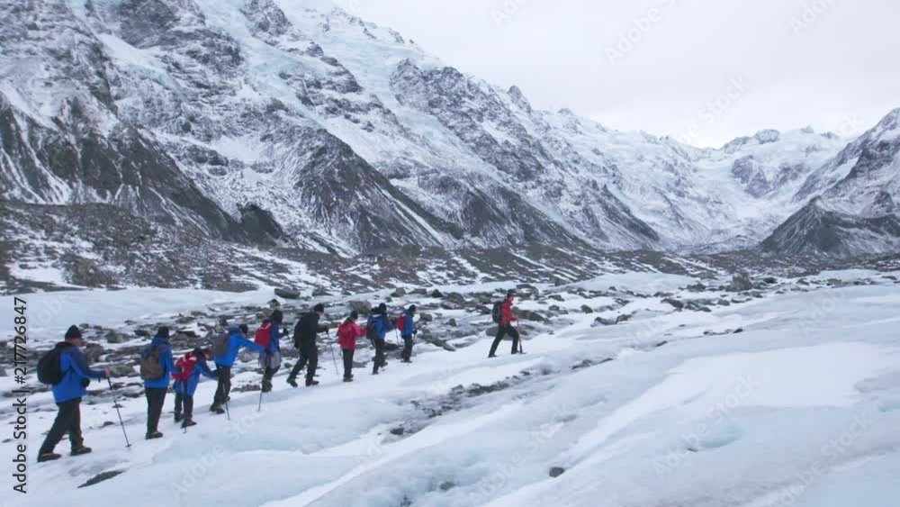 Walking on a glacier with crampons. Ice, cold, winter scenes. Shot in New Zealand. Walking on a glacier with crampons. Ice, cold, winter scenes. Shot in New Zealand.