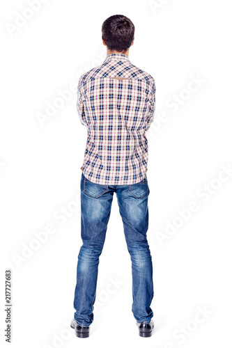 Man with arms crossed full body