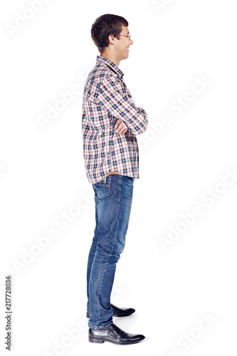 Man with arms crossed full body