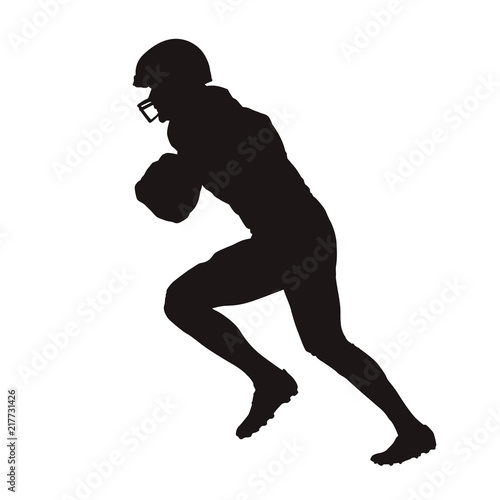 American football player running with ball, side view. Isolated vector silhouette