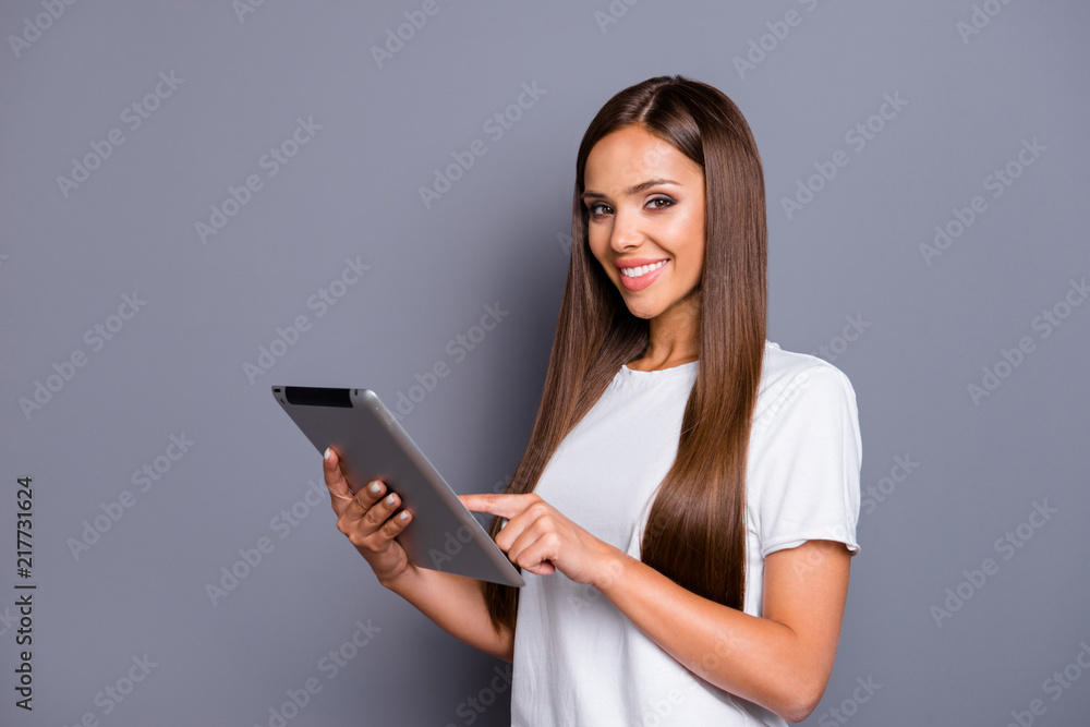 Close up portrait of charming confident woman having tablet in h Close up portrait of charming confident woman having tablet in h