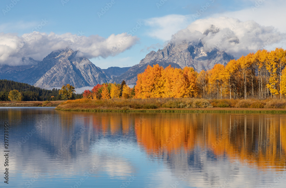 Scenic Reflection Landscape of the Tetons in Autumn