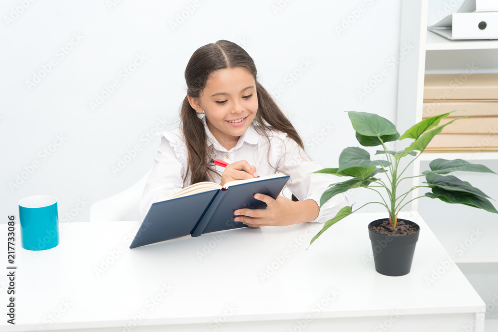 English concept. Little child write English in notebook. Cute girl make English lesson. Pupil do homework in English. Language is the dress of thought English concept. Little child write English in notebook. Cute girl make English lesson. Pupil do homework in English. Language is the dress of thought