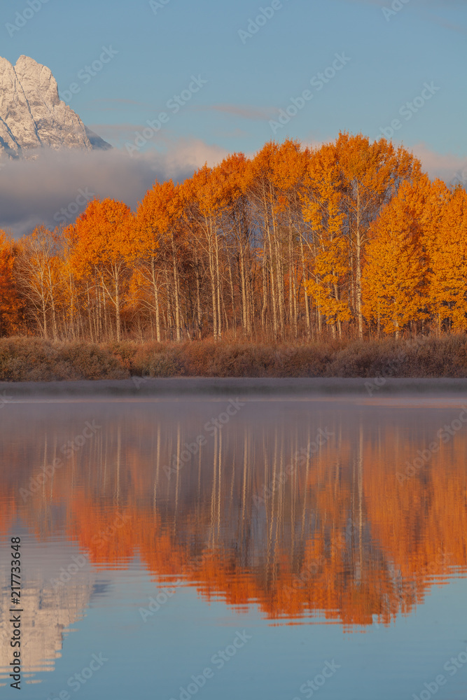 Scenic Reflection Landscape of the Tetons in Autumn