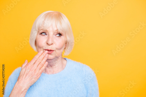 Close up portrait of funky beautiful talkative granny covers mou photo