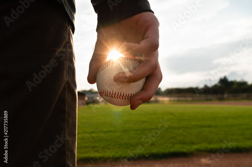 Teen boy holds baseball photo