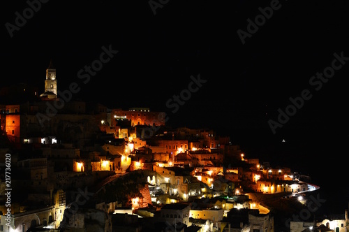Panoramic view of ancient town of Matera (Sassi di Matera) by night. Basilicata, Italy.
