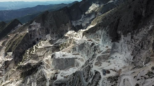 Aerial: Flying above world famous marble quarry near the city of Carrara, Tuscany, Italy