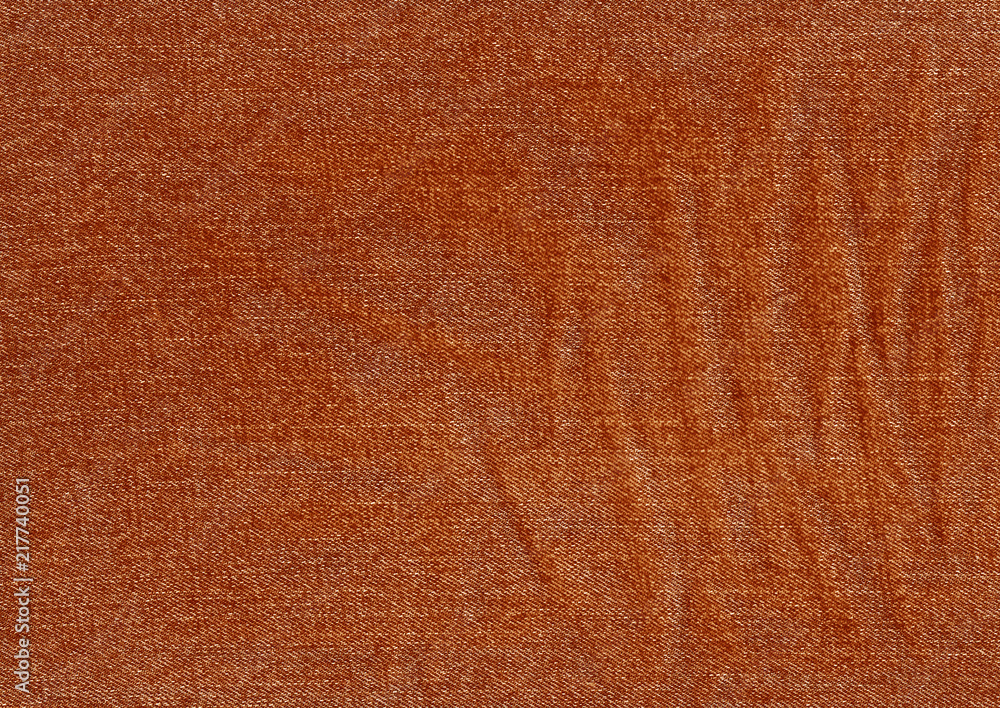 Fototapeta premium Jeans texture in orange tone.