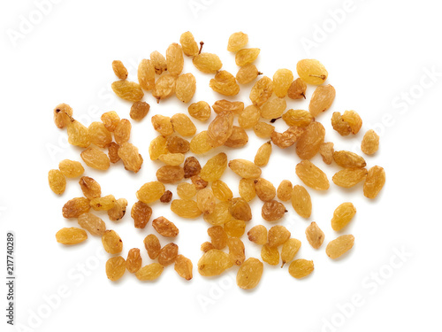 Yellow raisins isolated on white background. Top view.