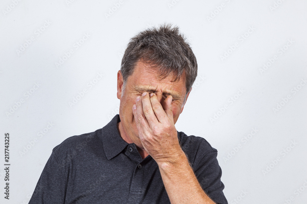 portrait of astonished senior man in studio portrait of astonished senior man in studio