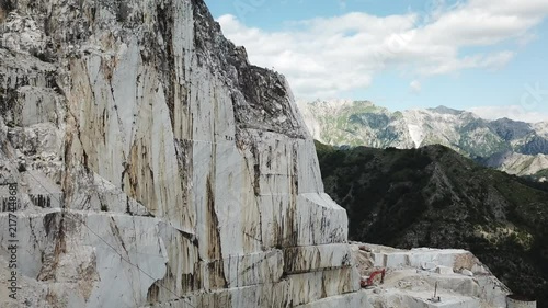 Aerial: Flying above world famous marble quarry near the city of Carrara, Tuscany, Italy photo