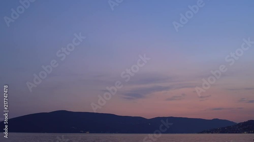 Dramatic sunset over the mountain peaks. Pelister is a peak of mountain called Baba, Macedonia photo