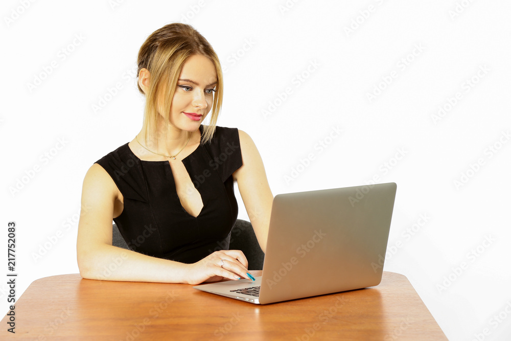 Girl businesswoman working behind laptop, computer isolated on white background Girl businesswoman working behind laptop, computer isolated on white background