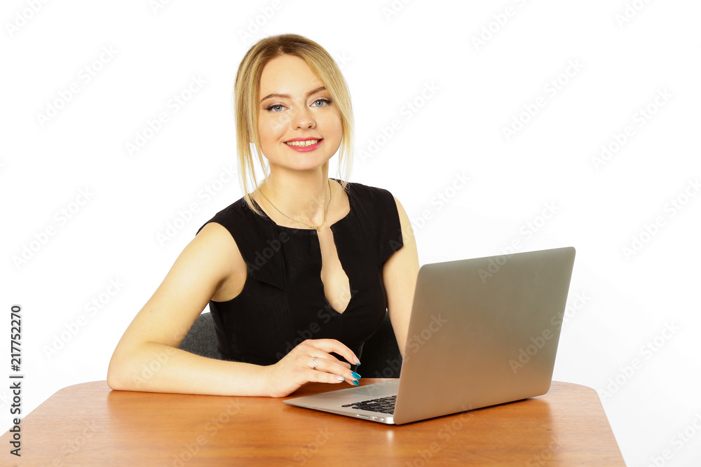 Girl businesswoman working behind laptop, computer isolated on white background Girl businesswoman working behind laptop, computer isolated on white background