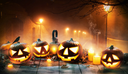 Scary horror background with halloween pumpkins jack o lantern