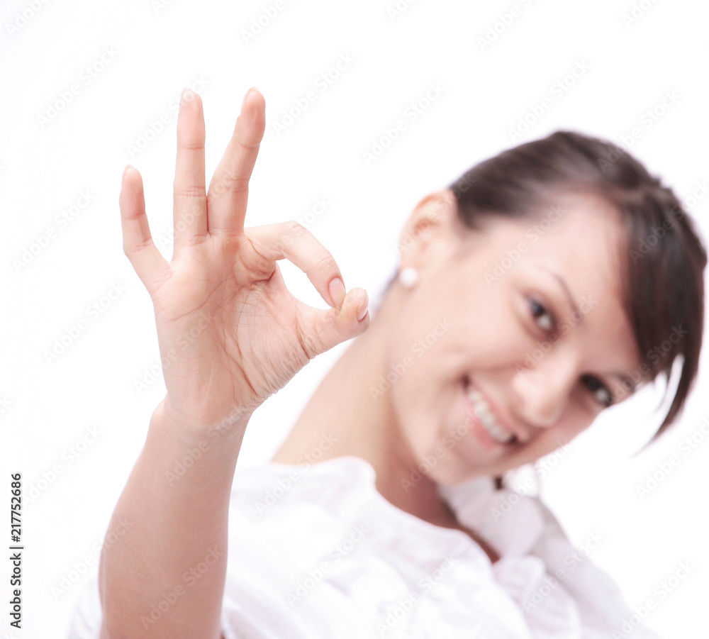 closeup.successful young woman showing the sign OK closeup.successful young woman showing the sign OK