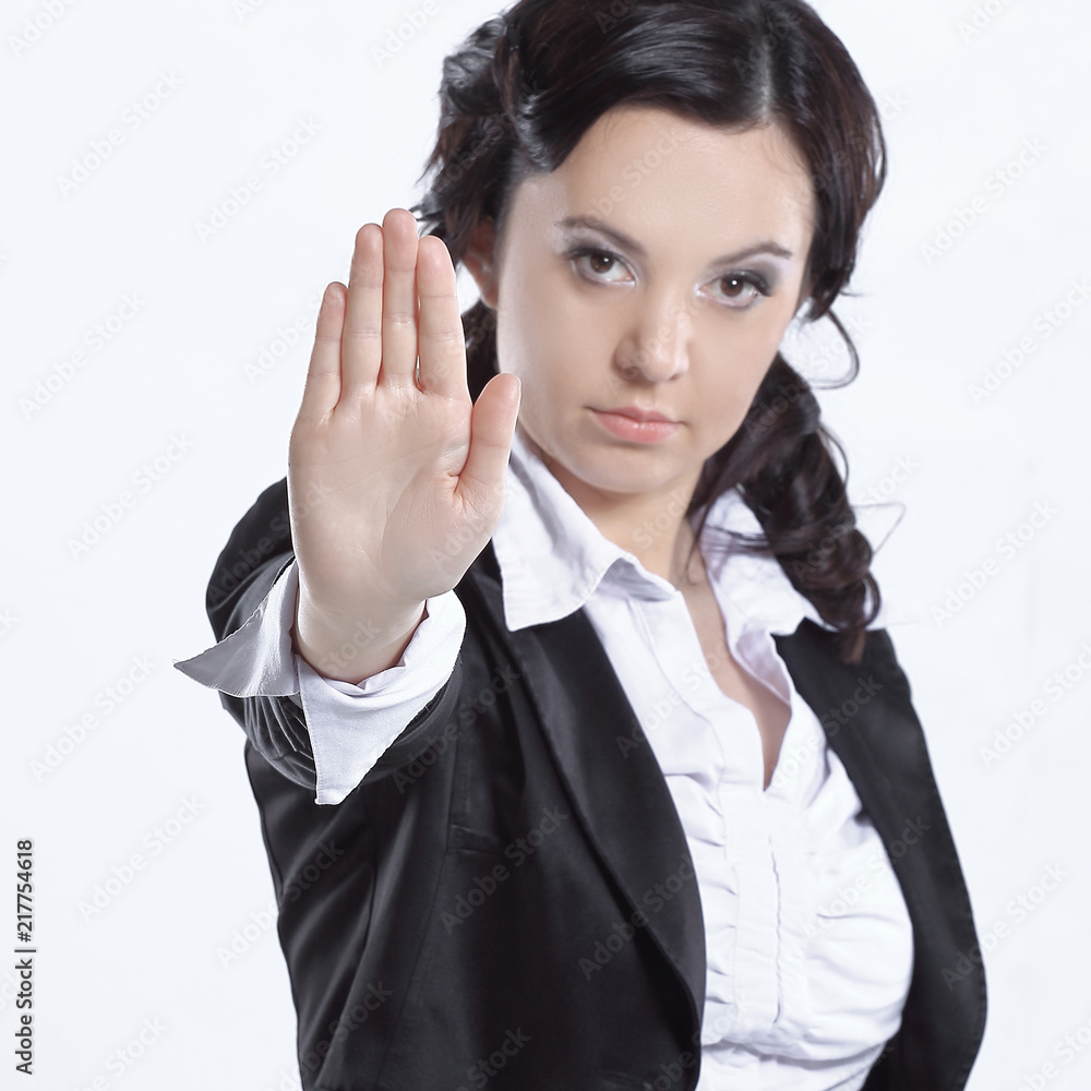 Business woman making stop sign - isolated over white Business woman making stop sign - isolated over white