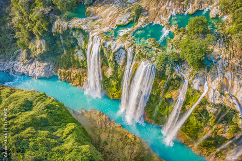 Amazing crystalline blue water of Tamul waterfall at Huasteca Potosina in San Luis Potosi, Mexico photo