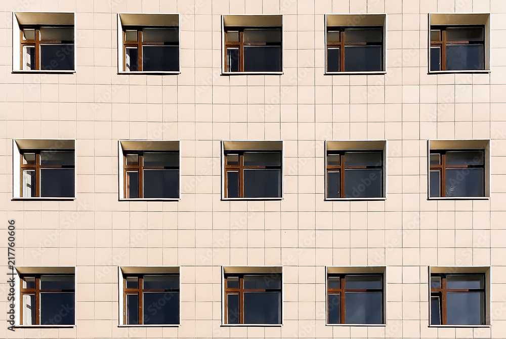 Square Windows of the building on a yellow background, lots of Windows Square Windows of the building on a yellow background, lots of Windows