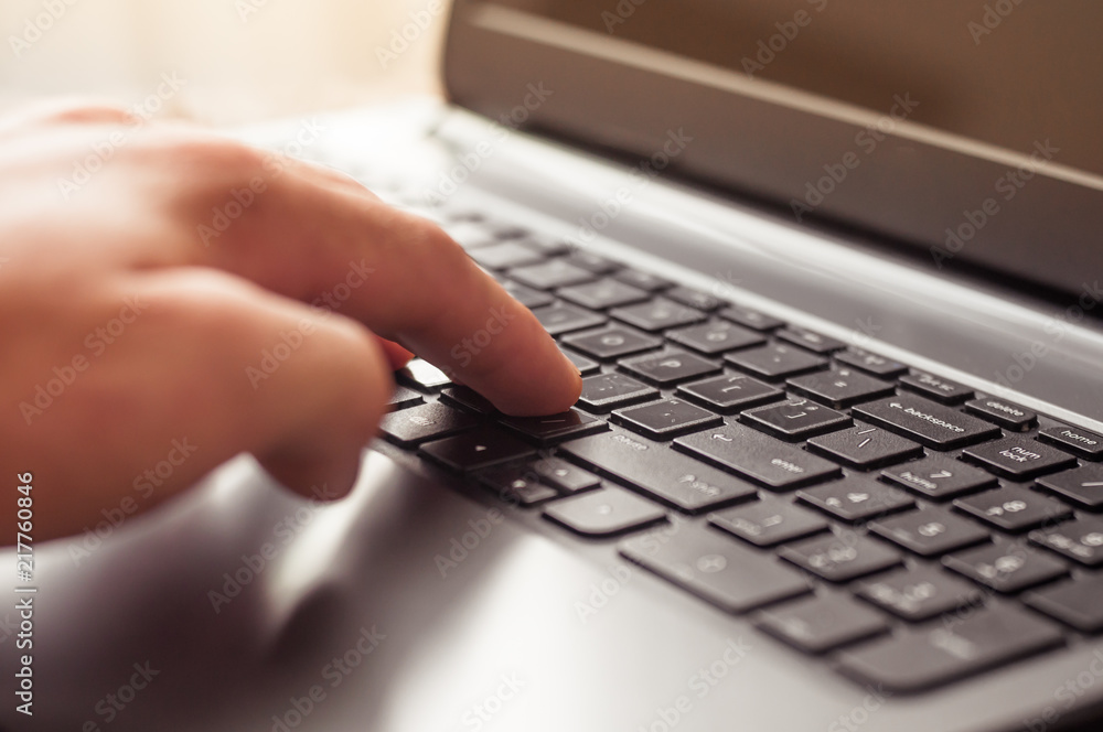 Macro photo of female hands typing on laptop. businesswoman working at office computer. Macro photo of female hands typing on laptop. businesswoman working at office computer.