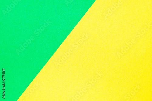 Green and yellow color corrugated cardboard texture background. Trend colors, geometric cardboard paper background.