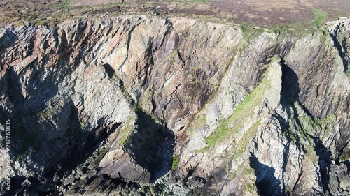 Aerial view of the beautiful cliffs close to the historic South Stack lighthouse on Anglesey - Wales photo