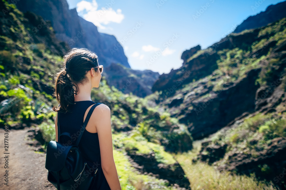 Traveler woman enjoy amazing Masca Gorge valley landscape on Tenerife island