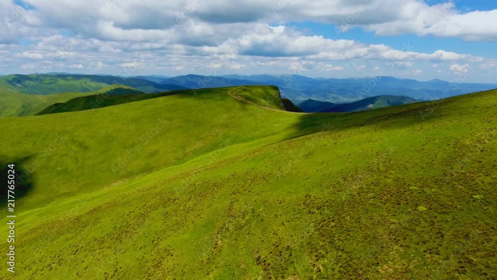 Aerial shot of a romantic mountaneous area in the Carpathians in summer Aerial shot of a romantic mountaneous area in the Carpathians in summer