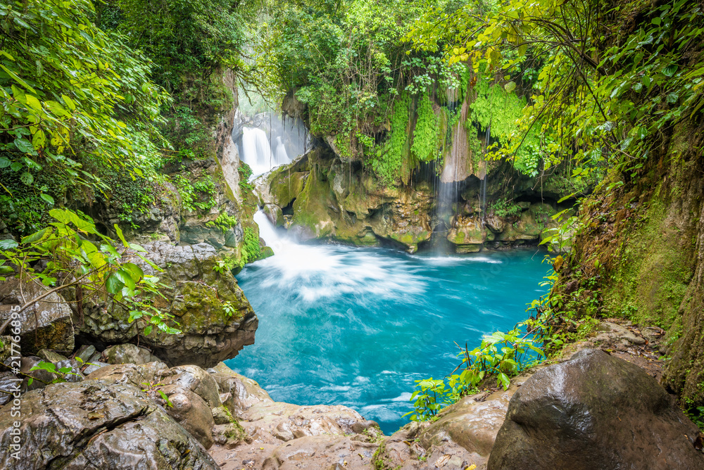 Amazing crystalline blue water of Puente de Dios waterfall at Huasteca Potosina in San Luis Potosi, Mexico