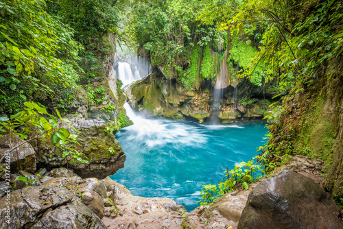 Amazing crystalline blue water of Puente de Dios waterfall at Huasteca Potosina in San Luis Potosi, Mexico
