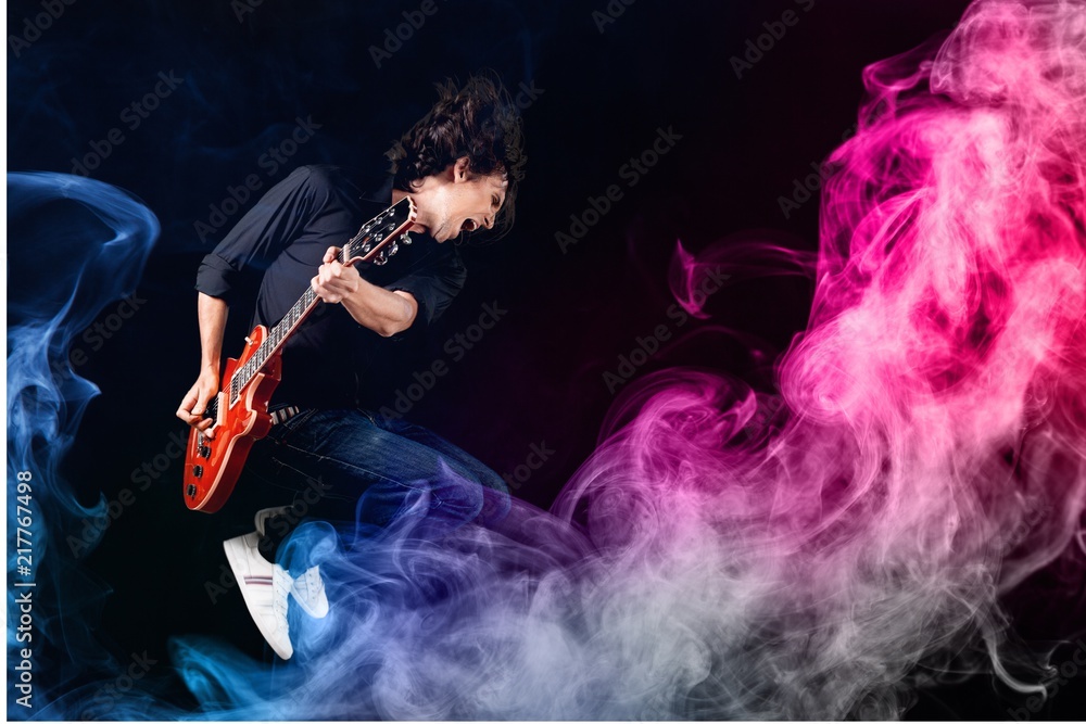 Musician Jumping and color smoke
