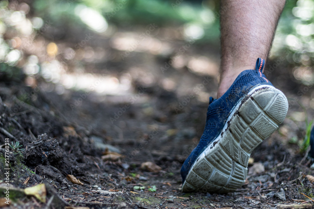 Man running on a dirt (mud) path (Zlaca, Bosnia) Man running on a dirt (mud) path (Zlaca, Bosnia)