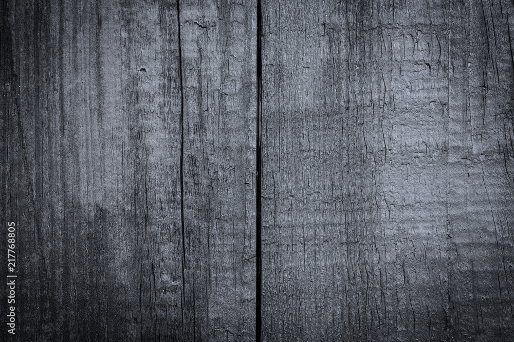 Black wood background. / Texture of old rough wooden planks Black wood background. / Texture of old rough wooden planks