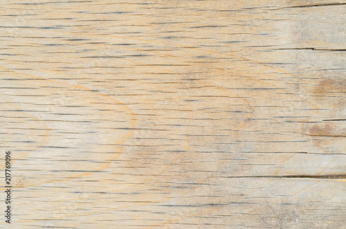 Texture of old weathered plywood, cracked from time and weather. Old furniture background
