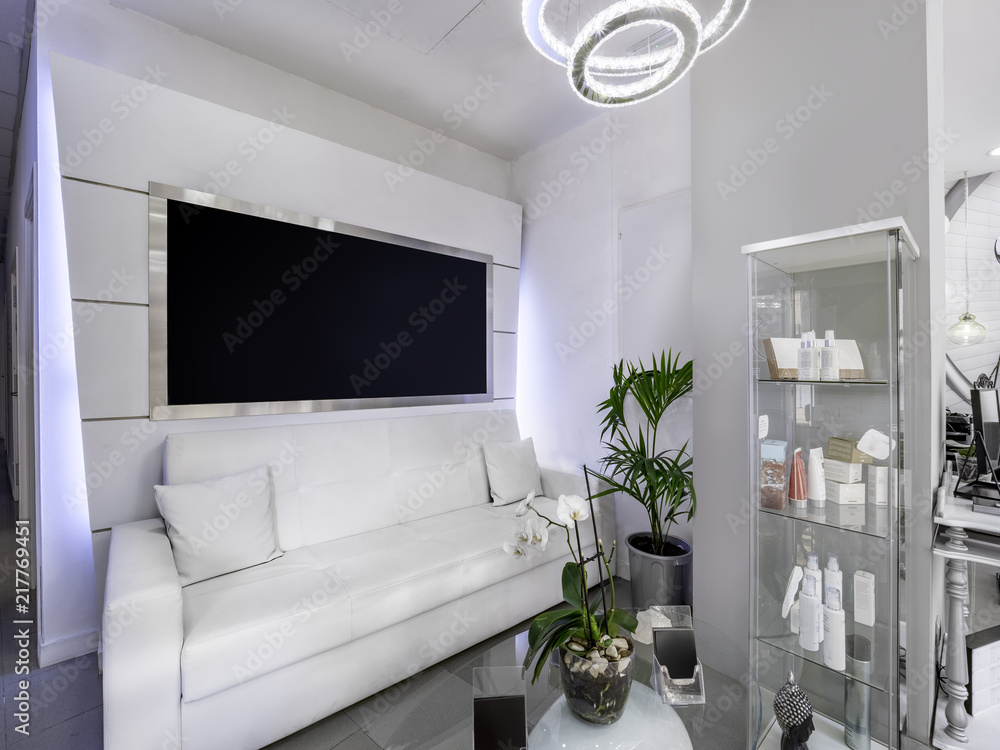 Indoor Mockup Clean And Bright Waiting Room Of A Beauty Or Hair Salon With Plant White Sofa And Banners Stock Photo Adobe Stock