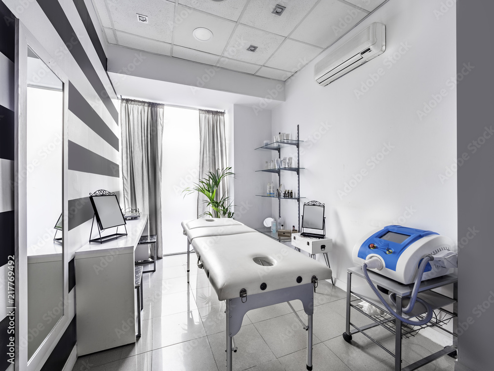 View of an Interior of a modern clean massage room with black and white  luxury decor. Stock Photo | Adobe Stock